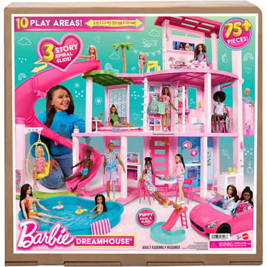A Barbie doll with a pink Dreamhouse playset.