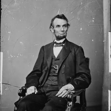 Abraham Lincoln’s portrait on the front of a U.S. five-dollar bill.