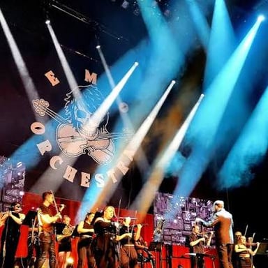 A rock band performing at an emo music concert.