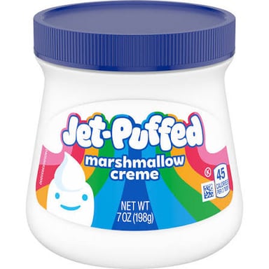 A jar of white marshmallow spread with a spoon