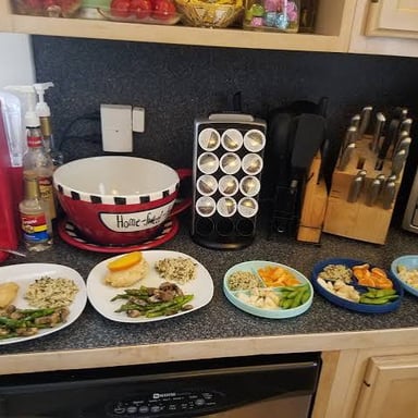 A home-cooked dinner being prepared in a kitchen