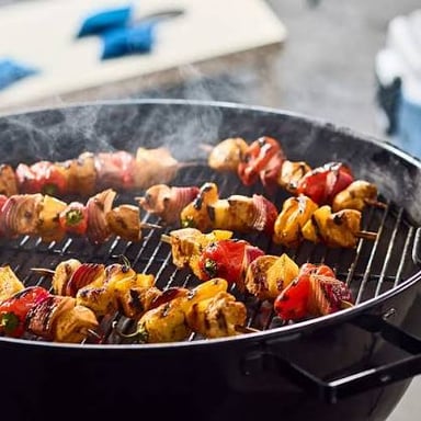 Pieces of food threaded onto a skewer to make a kebab.