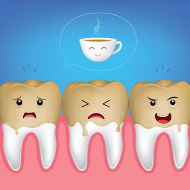 A cup of black tea shown beside an illustration of tooth staining.
