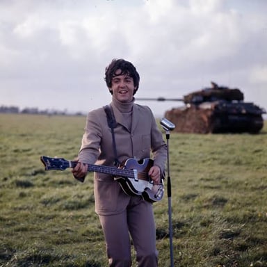 Paul McCartney playing a Höfner bass guitar