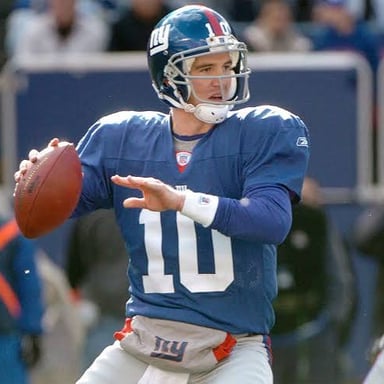Eli Manning in his New York Giants football uniform.