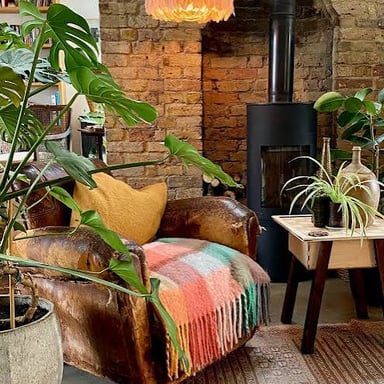 A comfortable reading nook in the corner of a room