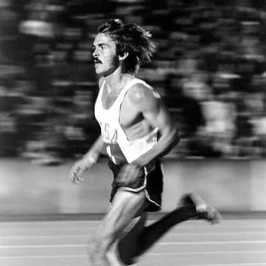 A runner leading a race, out in front of the others.