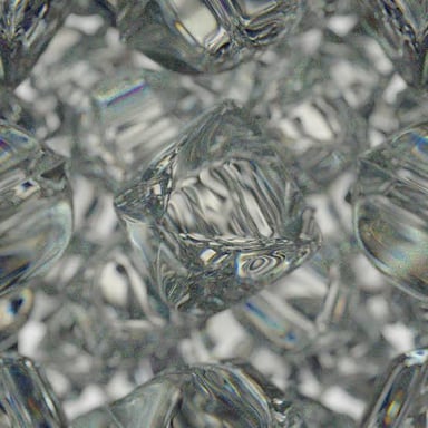 Clear ice cubes chilling a drink in a glass.