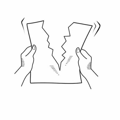 Hands ripping a sheet of paper into pieces.