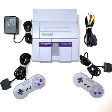 The Super Nintendo Entertainment System console with its controller.