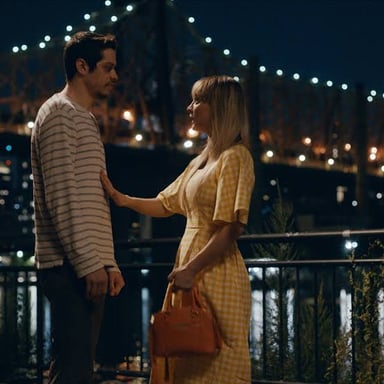 Two people meeting for the first time in a romantic-comedy-style encounter.