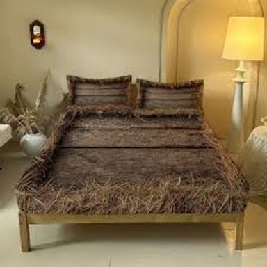 A simple bed made with straw or hay, evoking the expression “hit the hay.”
