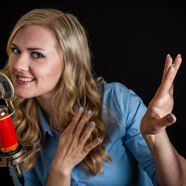 A video creator records a quiet whispering-style ASMR session.