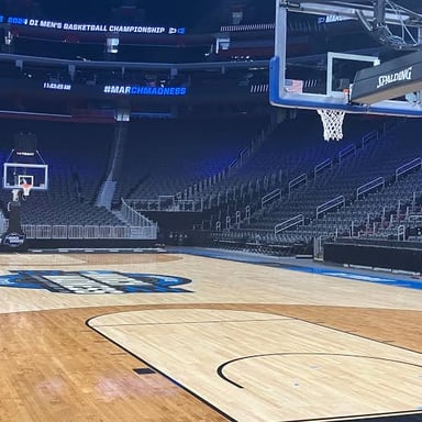 A college basketball court during an NCAA tournament game.