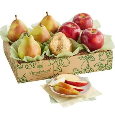 A Harry & David gift basket featuring pears and other gourmet foods.