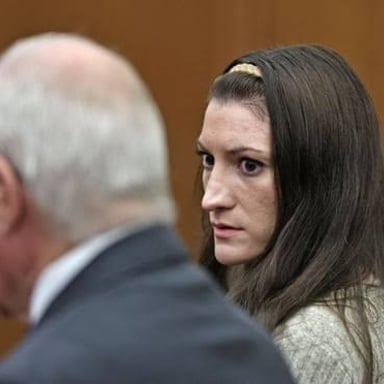 A person visibly denying an accusation