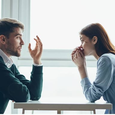 Two people talking candidly, illustrating the idea of being honest with yourself.