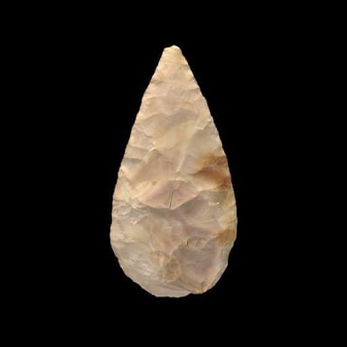 A stone hand axe, a tool associated with the Stone Age.