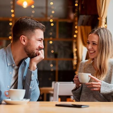 Two people talking casually, as if catching up on what’s new.