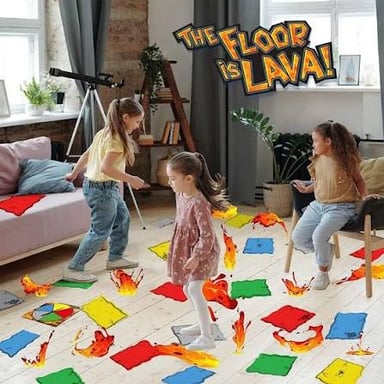 Children balance on cushions and furniture while pretending the floor is lava.