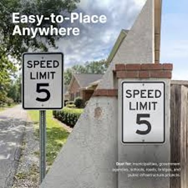 A road speed limit sign showing a speed in miles per hour.