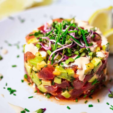 A serving of tuna tartare made with diced raw tuna.