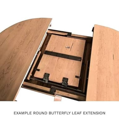 A dining table opened up with an extra panel widening its surface.