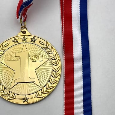 A gold medal, a familiar prize for winning a competition.