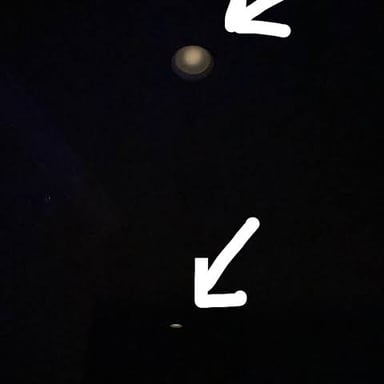 A room made dark because its lights are off.