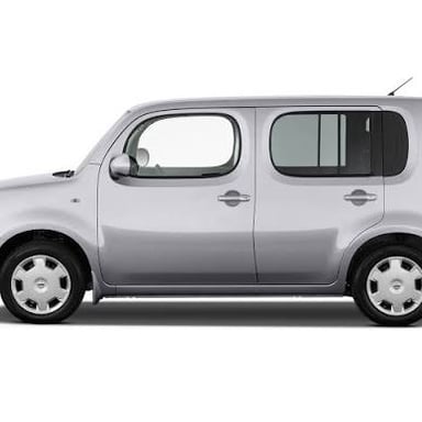 A Nissan Cube showing its tall, upright body and squared-off shape.