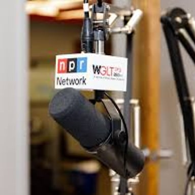 A radio studio microphone representing NPR broadcasting