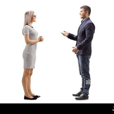 One person speaking while another listens.