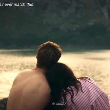 A romantic on-screen embrace suggesting a steamy love scene.