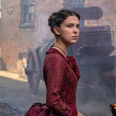 Enola Holmes, the younger sister of Sherlock Holmes, portrayed in a film adaptation.