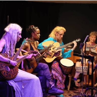 Musicians playing together in an informal jam session.