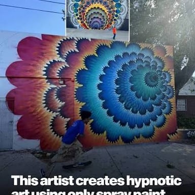 A street artist holding a spray paint can.