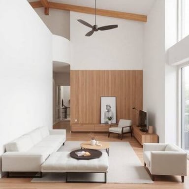 A sparsely furnished minimalist interior illustrating “less is more.”