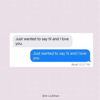 A smartphone displaying a personal text message expressing affection.