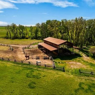 Open ranch land, the kind of property commonly measured in acres.