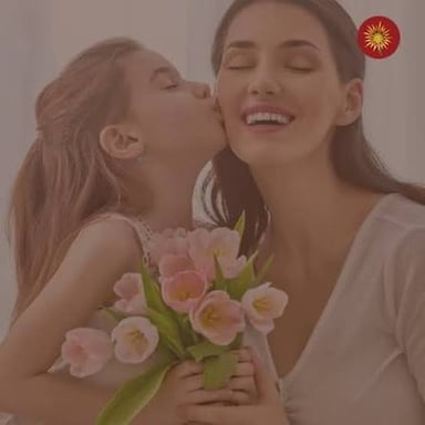 A mother and daughter sharing an affectionate conversation.