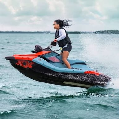 A Sea-Doo personal watercraft moving across the water.