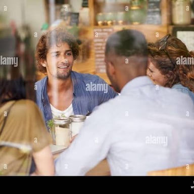 Two friends meeting at a cafe