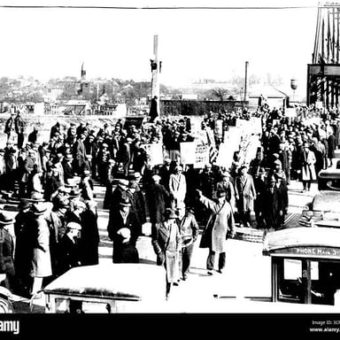 A large crowd moving into a city or venue.