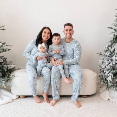 People wearing matching pajamas, illustrating “matching PJs.”