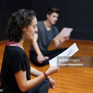 Actor holding a script on a film set