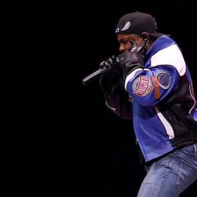 Rapper Kendrick Lamar performs onstage.