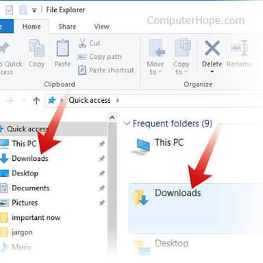 A laptop screen showing a file downloading from the internet.