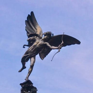 A sculpture depicting Eros as a winged archer.