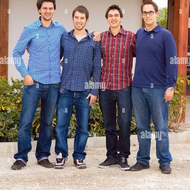 A group of adult men standing together.