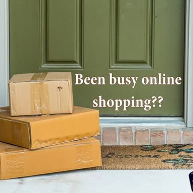 A group of cardboard parcels delivered to a home.